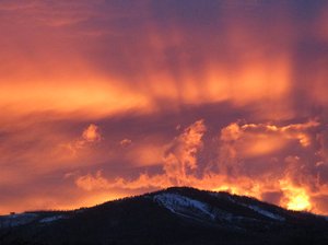 Sunset over Pajarito Mountain ski area, view from downtown Los Alamos, NMphotograph