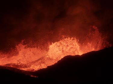 Erupting lava.